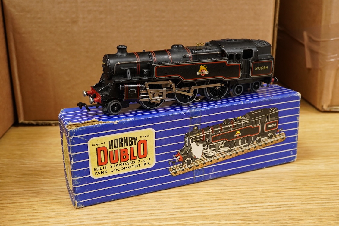 A collection of Hornby Dublo railway for 3-rail running, including two locomotives; an LMS Duchess of Athol 4-6-2, locomotive box, tender unboxed, and a boxed BR Standard Class 4 2-6-4T, 80054, together with five boxed b